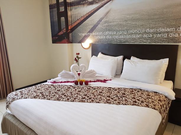 Imagen de la habitación del Hotel Kyriad Grand Master Purwodadi. Foto 5