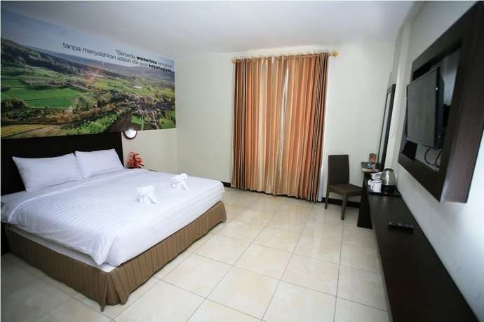 Imagen de la habitación del Hotel Kyriad Grand Master Purwodadi. Foto 6