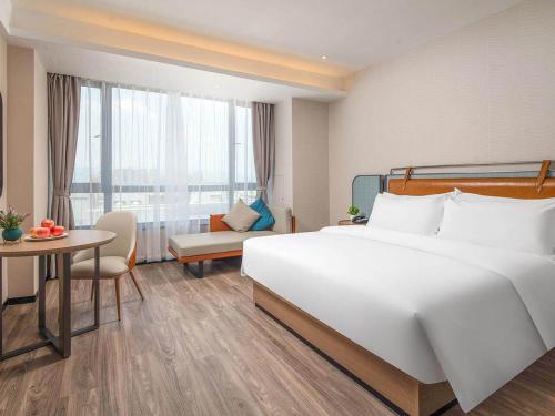 Imagen general del Hotel Kyriad Guigang Wuyue Plaza Railway Station. Foto 3