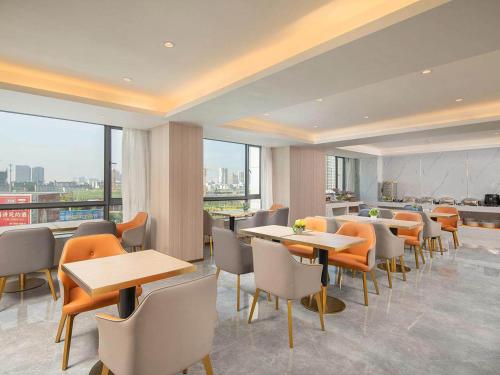 Imagen general del Hotel Kyriad Guigang Wuyue Plaza Railway Station. Foto 4