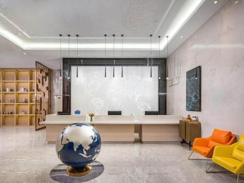 Imagen general del Hotel Kyriad Guigang Wuyue Plaza Railway Station. Foto 11