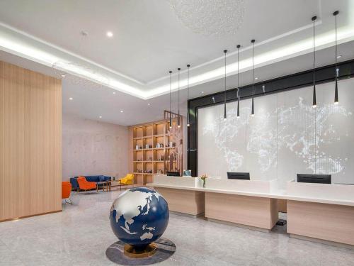 Imagen general del Hotel Kyriad Guigang Wuyue Plaza Railway Station. Foto 12