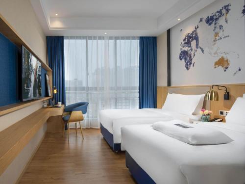 Imagen general del Hotel Kyriad Hanzhong Railway Station. Foto 7