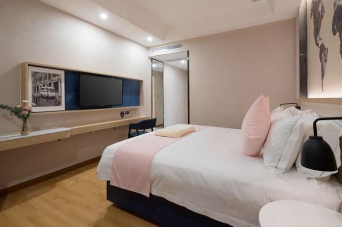 Imagen de la habitación del Hotel Kyriad Hotel Shangxiajiu Branch. Foto 7
