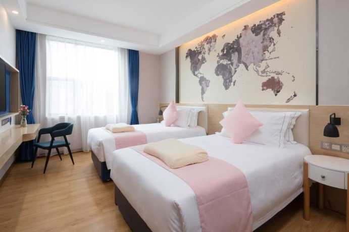 Imagen de la habitación del Hotel Kyriad Hotel Shangxiajiu Branch. Foto 9