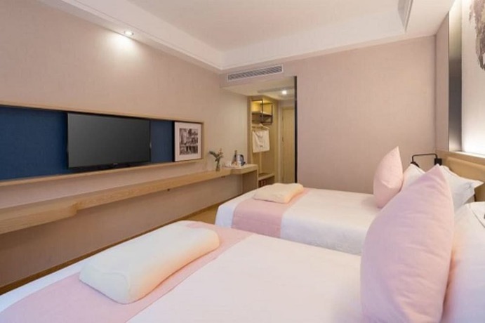 Imagen de la habitación del Hotel Kyriad Hotel Shangxiajiu Branch. Foto 10