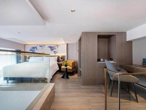 Imagen de la habitación del Hotel Kyriad Jieyang Wanda Plaza. Foto 19