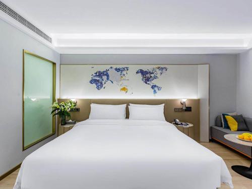 Imagen general del Hotel Kyriad Jiujiang Happy City. Foto 2