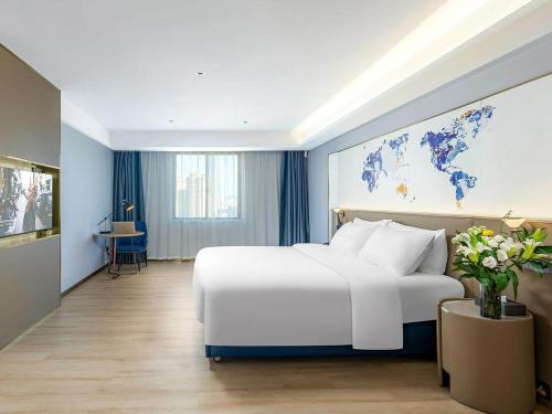Imagen general del Hotel Kyriad Jiujiang Happy City. Foto 7