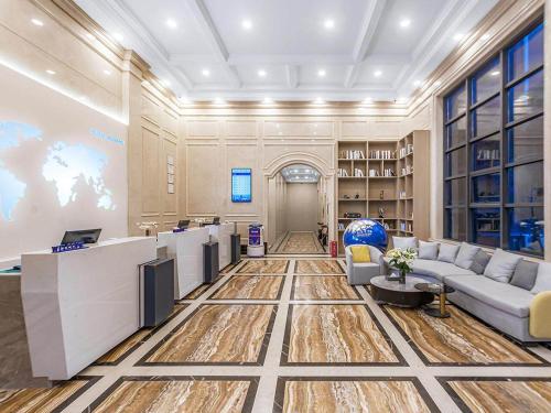 Imagen general del Hotel Kyriad Jiujiang Happy City. Foto 9