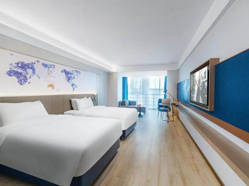 Imagen general del Hotel Kyriad Jiujiang Happy City. Foto 10