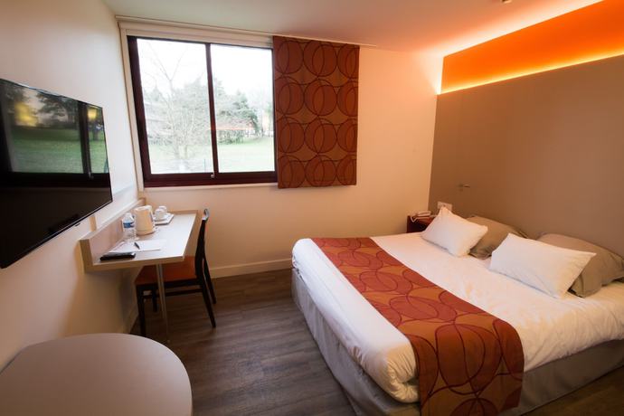 Imagen de la habitación del Hotel Kyriad - L'Isle-D'Abeau Bourgoin-Jallieu. Foto 2