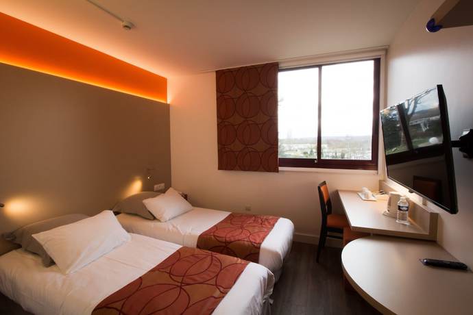 Imagen de la habitación del Hotel Kyriad - L'Isle-D'Abeau Bourgoin-Jallieu. Foto 4