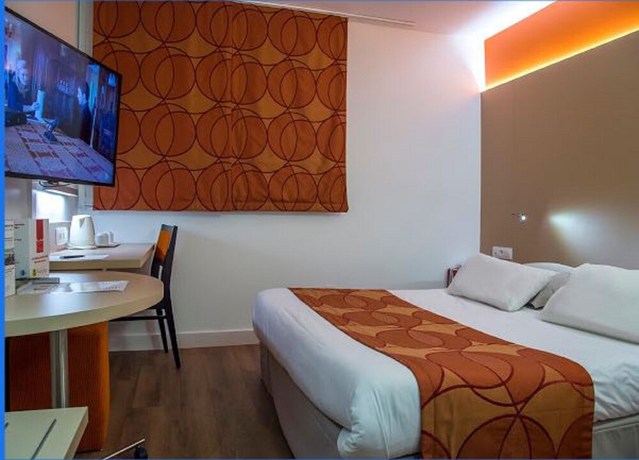 Imagen de la habitación del Hotel Kyriad - L'Isle-D'Abeau Bourgoin-Jallieu. Foto 13