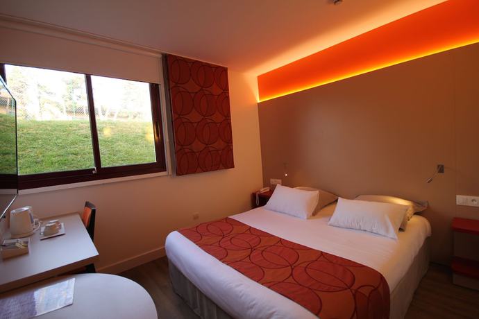 Imagen de la habitación del Hotel Kyriad - L'Isle-D'Abeau Bourgoin-Jallieu. Foto 17