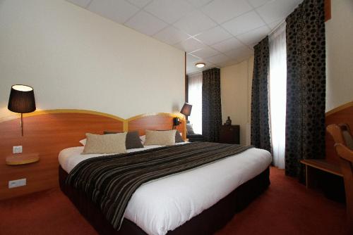Imagen de la habitación del Hotel Kyriad Lamballe. Foto 13