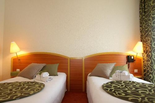 Imagen de la habitación del Hotel Kyriad Lamballe. Foto 19
