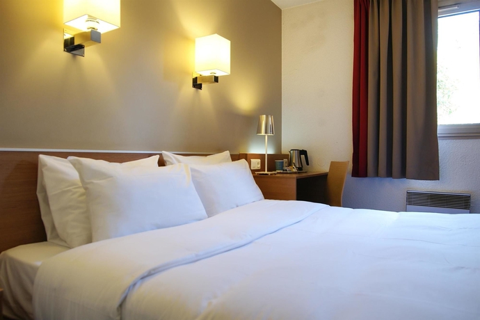 Imagen de la habitación del Hotel Kyriad Le Bourget Centre Parc Des Expositions. Foto 6