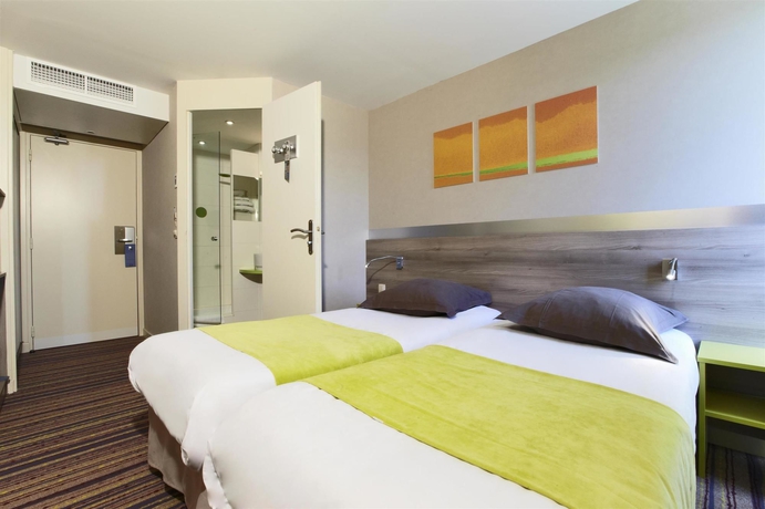 Imagen de la habitación del Hotel Kyriad Lyon Est. Foto 4