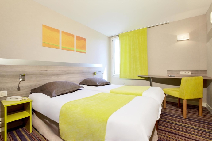 Imagen de la habitación del Hotel Kyriad Lyon Est. Foto 7