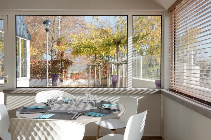 Imagen del bar/restaurante del Hotel Kyriad Lyon Sud - Givors. Foto 7
