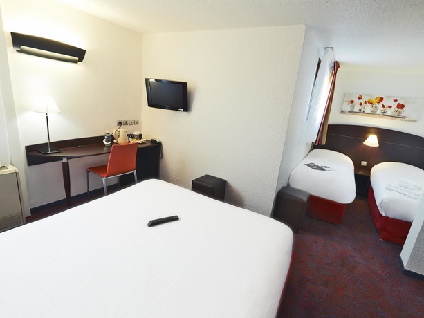 Imagen de la habitación del Hotel Kyriad Lyon Sud Saint Genis Laval. Foto 3