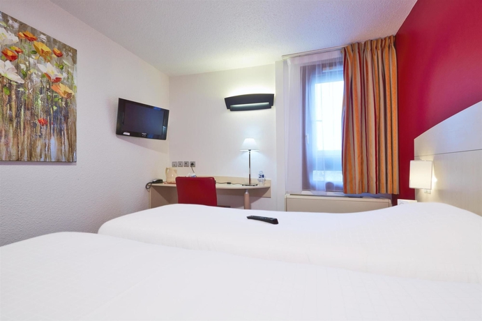 Imagen de la habitación del Hotel Kyriad Lyon Sud Saint Genis Laval. Foto 5