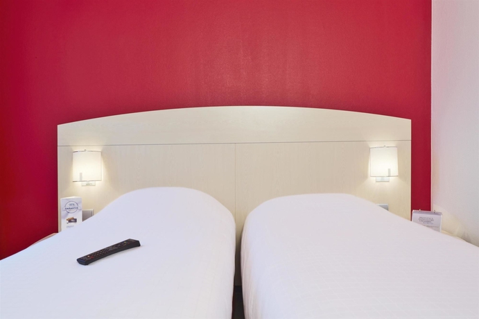 Imagen de la habitación del Hotel Kyriad Lyon Sud Saint Genis Laval. Foto 6