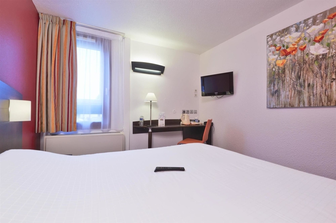 Imagen de la habitación del Hotel Kyriad Lyon Sud Saint Genis Laval. Foto 9