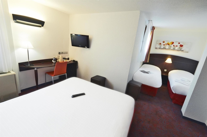 Imagen de la habitación del Hotel Kyriad Lyon Sud Saint Genis Laval. Foto 12