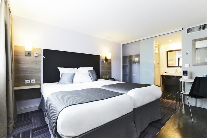 Imagen de la habitación del Hotel Kyriad Lyon Sud Sainte Foy. Foto 11