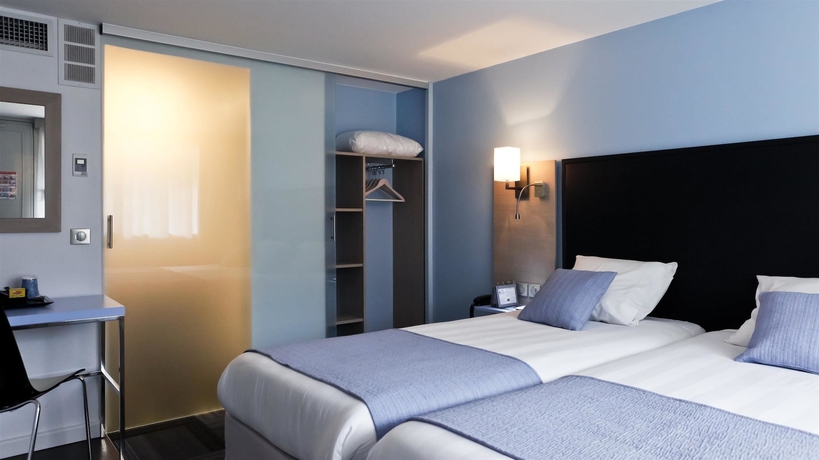 Imagen de la habitación del Hotel Kyriad Lyon Sud Sainte Foy. Foto 13