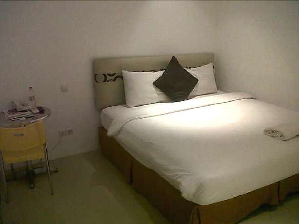 Imagen de la habitación del Hotel Kyriad M Sorong. Foto 8