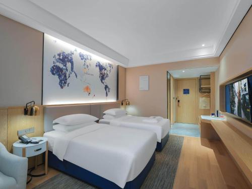 Imagen de la habitación del Hotel Kyriad Marvelous Bozhou Wanda Plaza. Foto 17