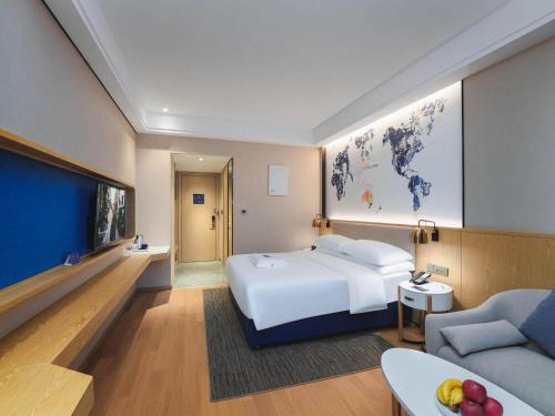 Imagen de la habitación del Hotel Kyriad Marvelous Bozhou Wanda Plaza. Foto 18