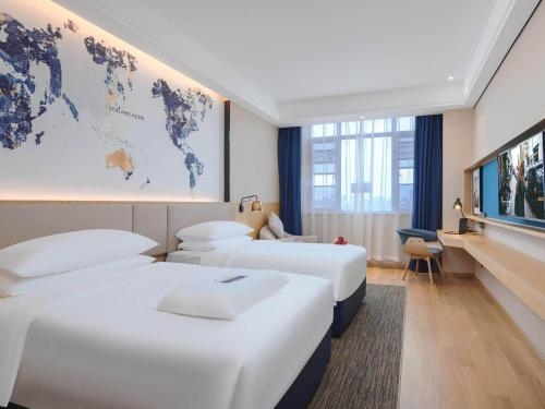 Imagen general del Hotel Kyriad Marvelous Bozhou Wanda Plaza. Foto 3