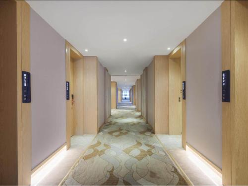 Imagen general del Hotel Kyriad Marvelous Bozhou Wanda Plaza. Foto 14