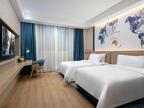 Imagen de la habitación del Hotel Kyriad Marvelous Changde Pedestrian Street. Foto 19