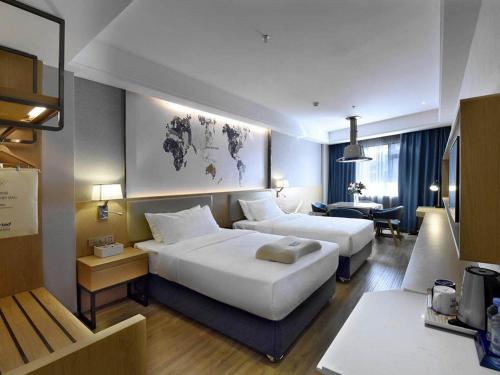 Imagen de la habitación del Hotel Kyriad Marvelous Changsha Furong Plaza Railway Station. Foto 17