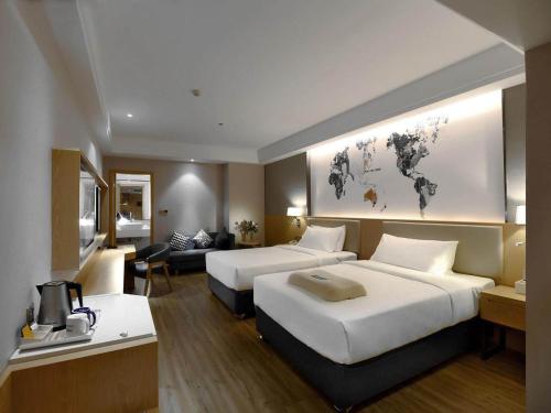 Imagen de la habitación del Hotel Kyriad Marvelous Changsha Furong Plaza Railway Station. Foto 19