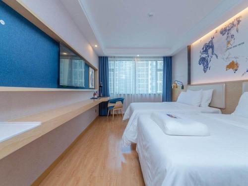 Imagen de la habitación del Hotel Kyriad Marvelous Changsha Xiangya. Foto 18