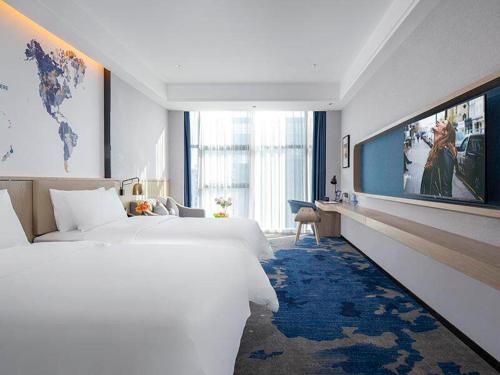 Imagen de la habitación del Hotel Kyriad Marvelous Fangchenggang Administration Center High-Speed Railway Station. Foto 9