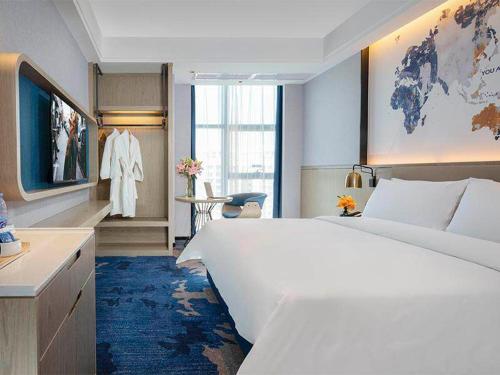 Imagen de la habitación del Hotel Kyriad Marvelous Fangchenggang Administration Center High-Speed Railway Station. Foto 11