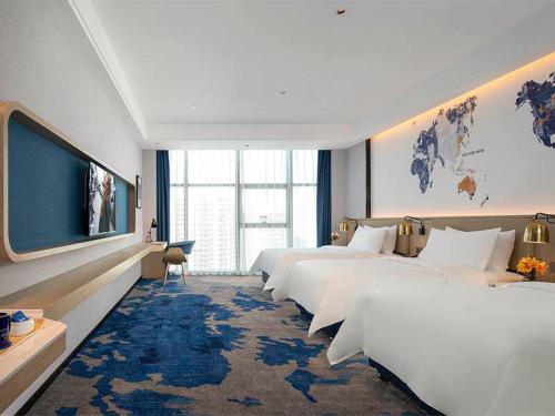 Imagen de la habitación del Hotel Kyriad Marvelous Fangchenggang Administration Center High-Speed Railway Station. Foto 14