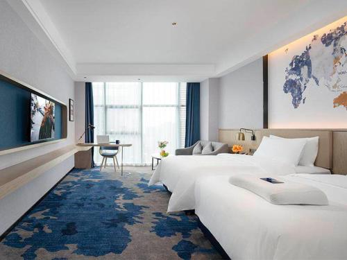 Imagen de la habitación del Hotel Kyriad Marvelous Fangchenggang Administration Center High-Speed Railway Station. Foto 15