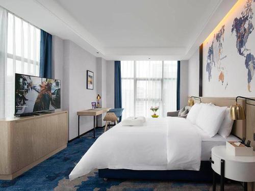 Imagen de la habitación del Hotel Kyriad Marvelous Fangchenggang Administration Center High-Speed Railway Station. Foto 17