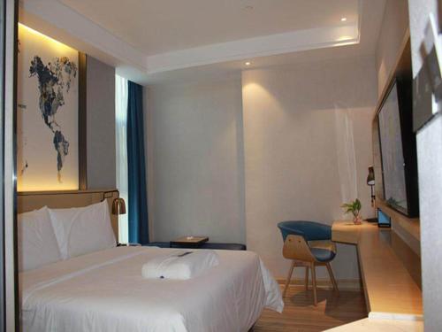 Imagen de la habitación del Hotel Kyriad Marvelous Guangzhou Baiyun International Airport. Foto 16
