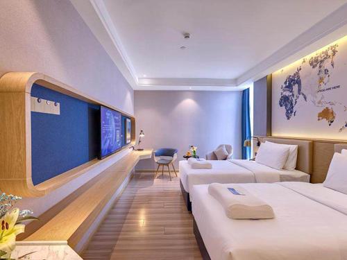 Imagen de la habitación del Hotel Kyriad Marvelous Guangzhou Baiyun International Airport. Foto 20