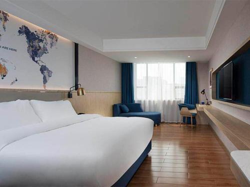 Imagen general del Hotel Kyriad Marvelous Guangzhou North Railway Station. Foto 3