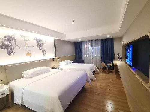 Imagen de la habitación del Hotel Kyriad Marvelous Guangzhou North Railway Station. Foto 17